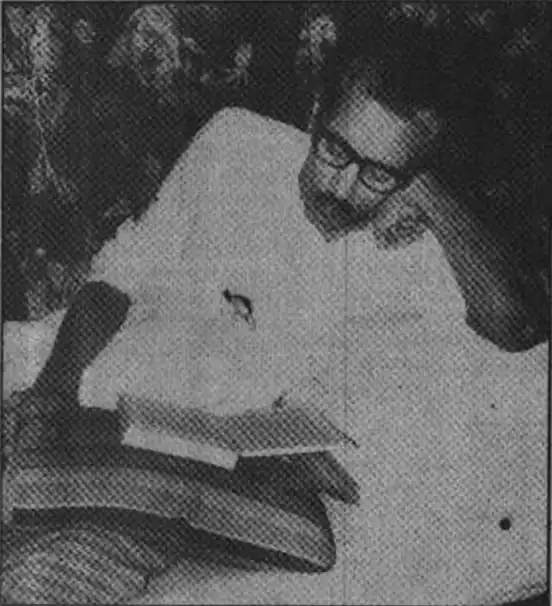 Sikander Abu Zafar reading a book at his hospital bed. The phot was published in Dainik Bangla on August 6, 1975